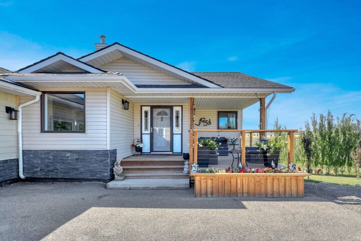 Property Photo: 434029 2 Street E AB T1S 1A1