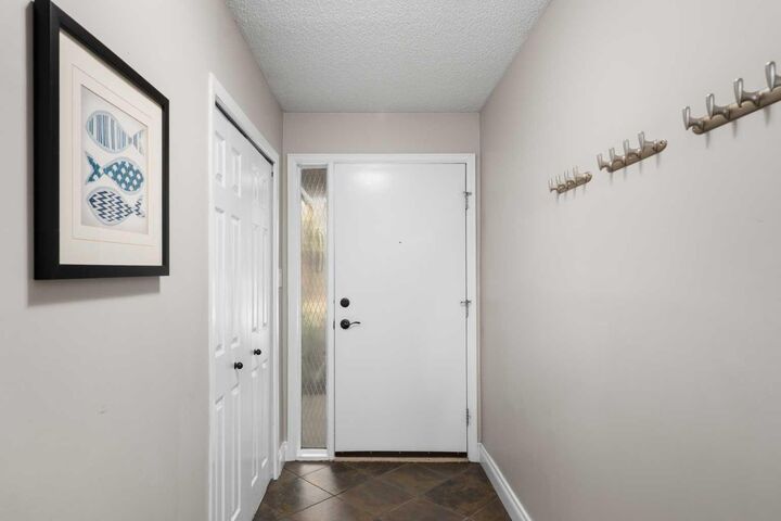 Property Photo:  10030 Oakmoor Way SW 52  AB T2V 4S8 