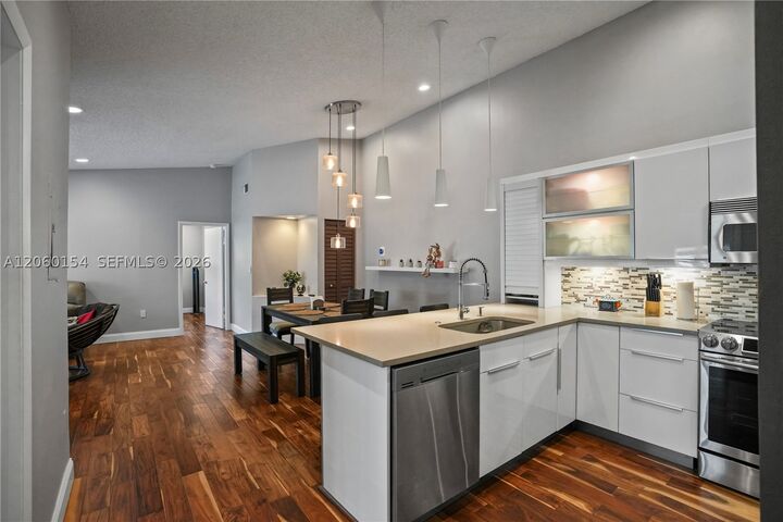 Property Photo:  4910 NW 102nd Ave 203-8  FL 33178 