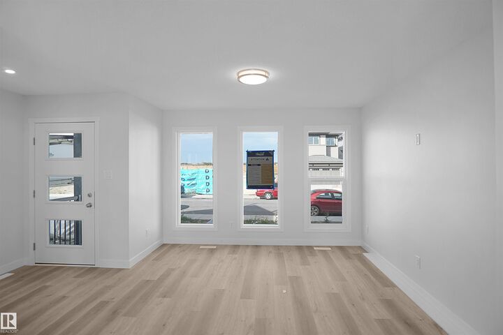 Property Photo: 7389 Keeler Crescent SW AB T6W 4J9