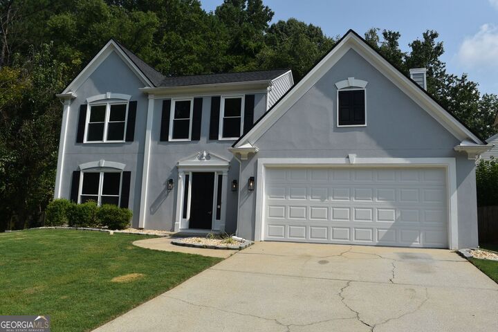 Property Photo: 10680 Glenbarr Drive GA 30097