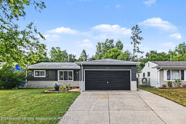 Property Photo:  2910 Gibson Street  MI 48911 