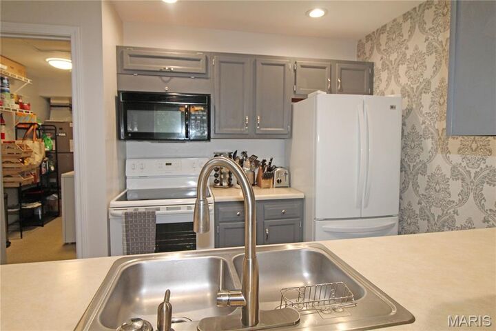 Property Photo:  1141 Sunbolt Drive D  MO 63129 