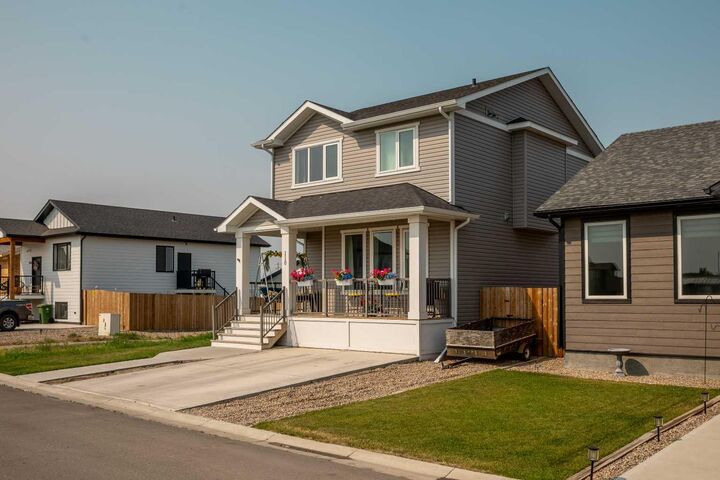 Property Photo: 110 Prairie Gold Street AB T1G 0G3