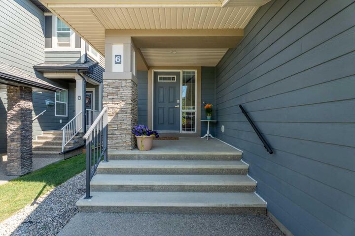 Property Photo: 6 Storm Mountain Place AB T1S 0L6