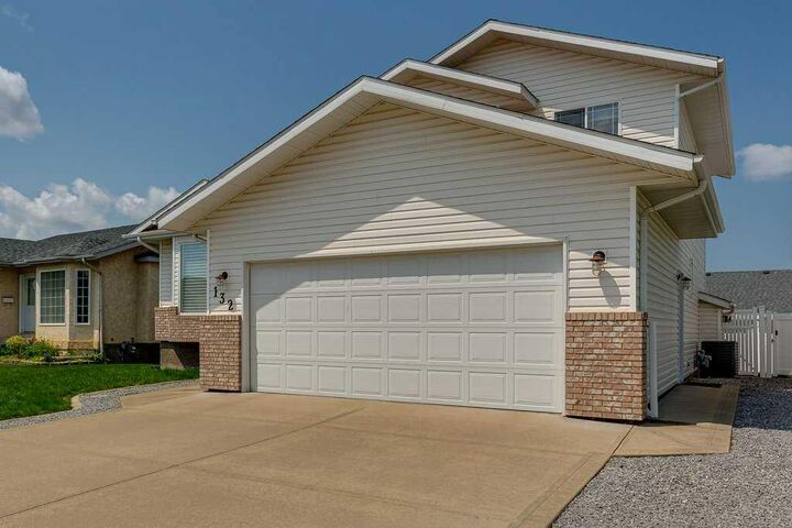 Property Photo:  132 Reichley Street  AB T4P 3S8 