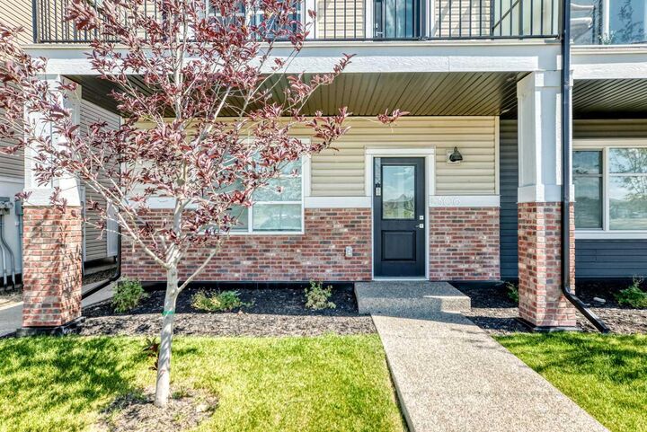 Property Photo:  135 Belmont Passage SW 308  AB T2X 4N4 