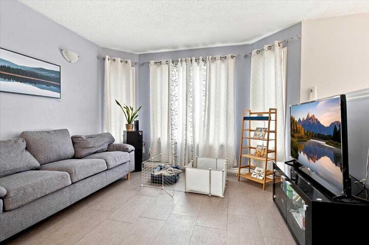 Property Photo:  13005 90 Street  AB T5X 0A9 