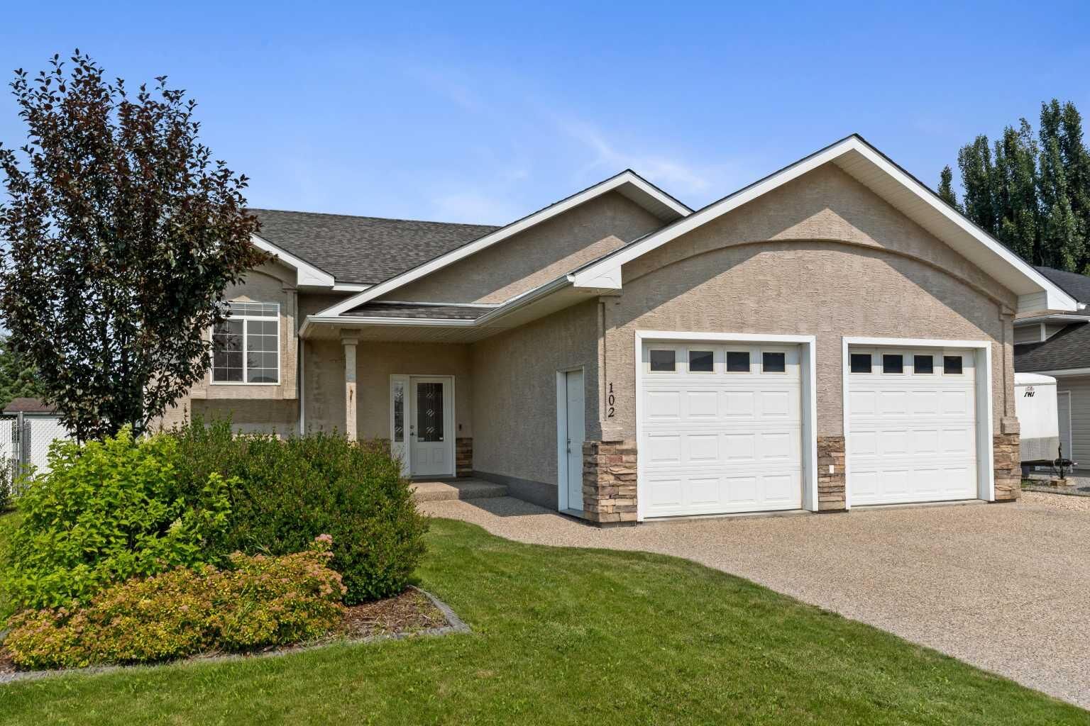 Property Photo: 102 Poplar Drive AB T7S 1W7