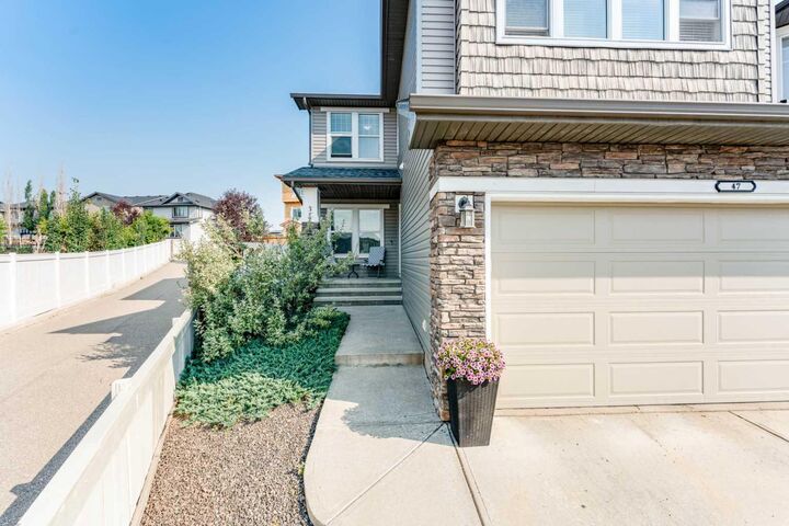 Property Photo: 47 Panatella Bay NW AB T3K 0T2