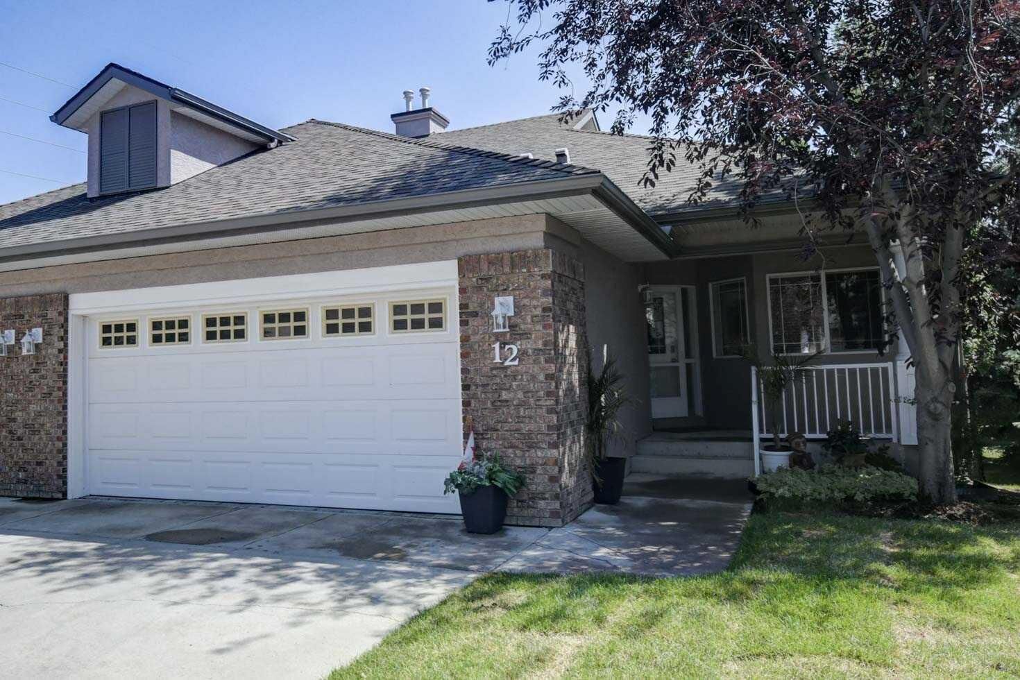 Property Photo: 12 Straddock Villas SW AB T3H 5C7