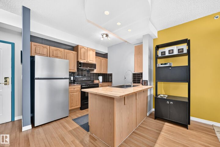 Property Photo: 14259 50 Street NW 421 AB T5A 5J2