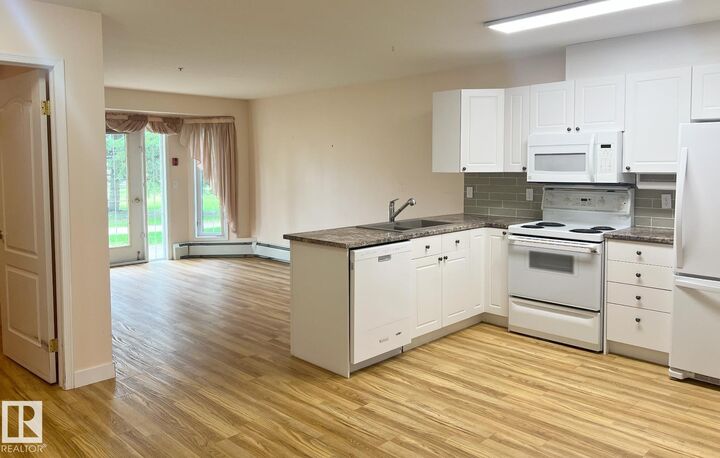 Property Photo: 13441 127 Street NW 147 AB T5J 6B6