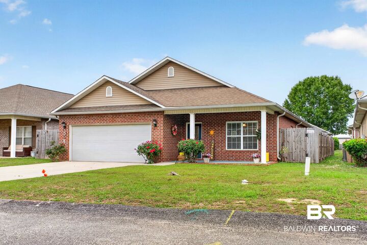 Property Photo: 7900 Park Place Dr S AL 36608