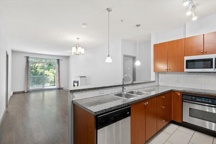 Property Photo: 100 Capilano Road 312 BC V3H 5M9