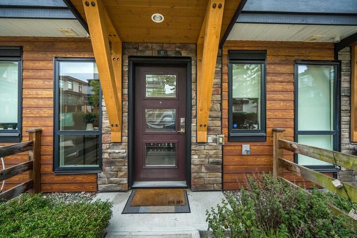 Property Photo: 16488 64 Avenue 11 BC V3S 6X6