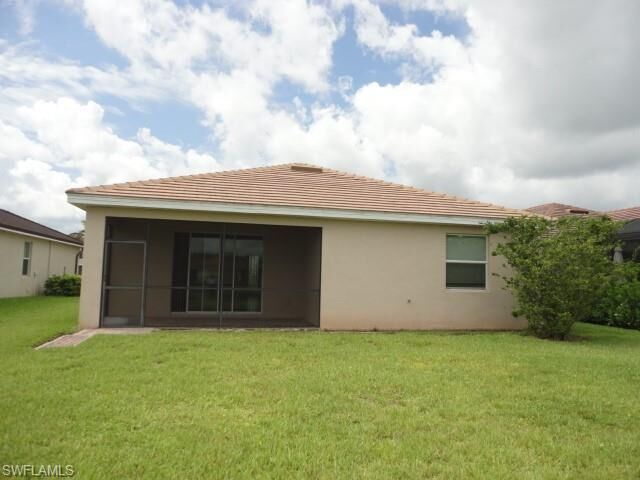 Property Photo: 16023 Mistflower Dr FL 33920