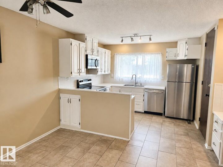 Property Photo:  7812 144 Avenue NW  AB T5C 2S1 