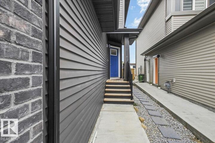 Property Photo: 7633 Koruluk Place SW AB T6W 4R7