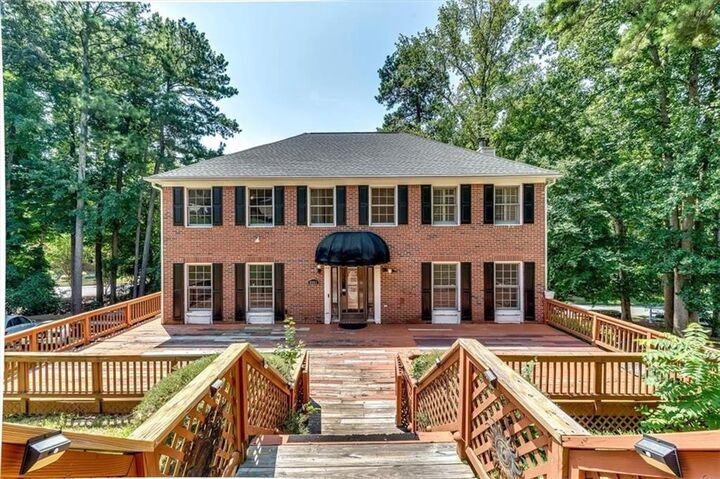 Property Photo:  6963 Whispering Oaks Court  GA 30087 