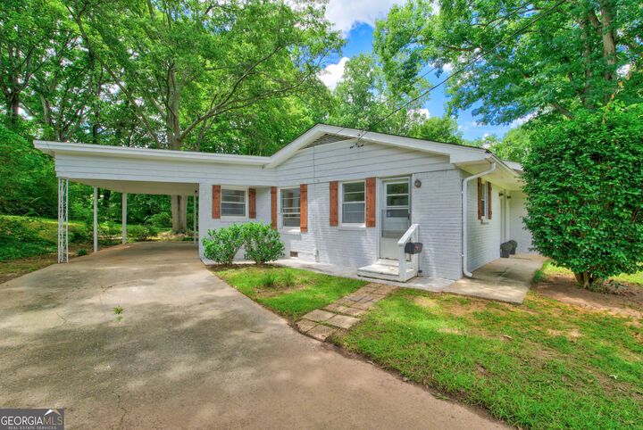 Property Photo:  3650 Fred Walker Drive SW  GA 30082 