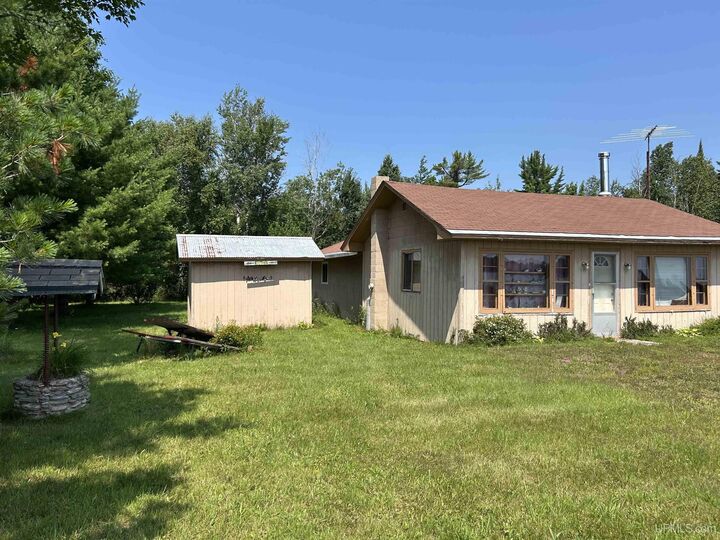 Property Photo:  33580 Rice Lake Road  MI 49945 