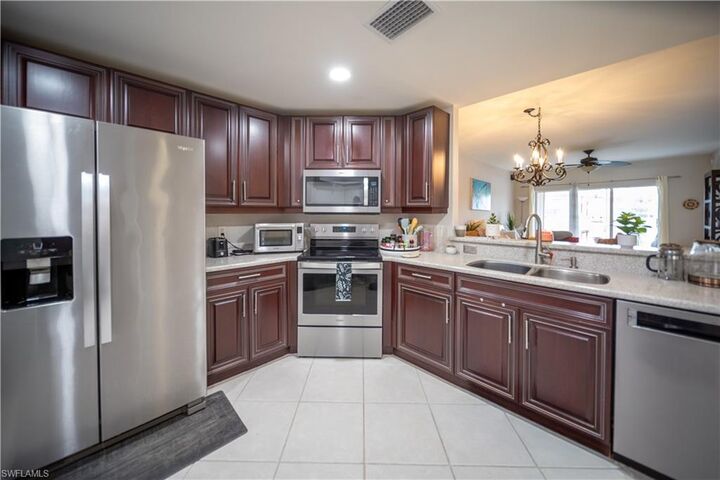 Property Photo:  3029 Driftwood Way 3303  FL 34109 