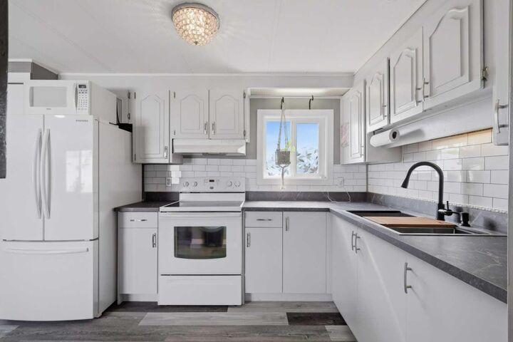 Property Photo:  5344 76 Street 341  AB T4P 2A6 