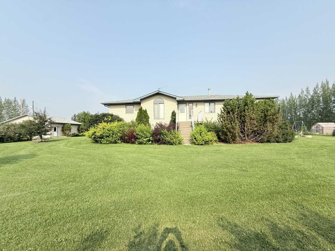 Property Photo: 861023 RR 214 AB T8S 1S5
