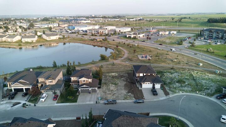 Property Photo: 25 Lakes Estates Circle AB T1P 1L8