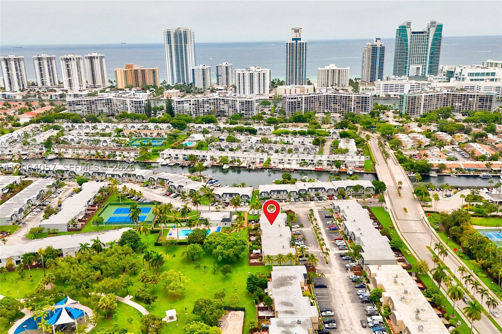 Property Photo:  2307 NE 7th St 40  FL 33009 