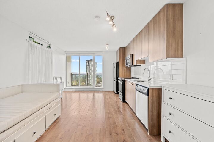 Property Photo: 13325 102A Avenue 2511 BC V3T 0J5