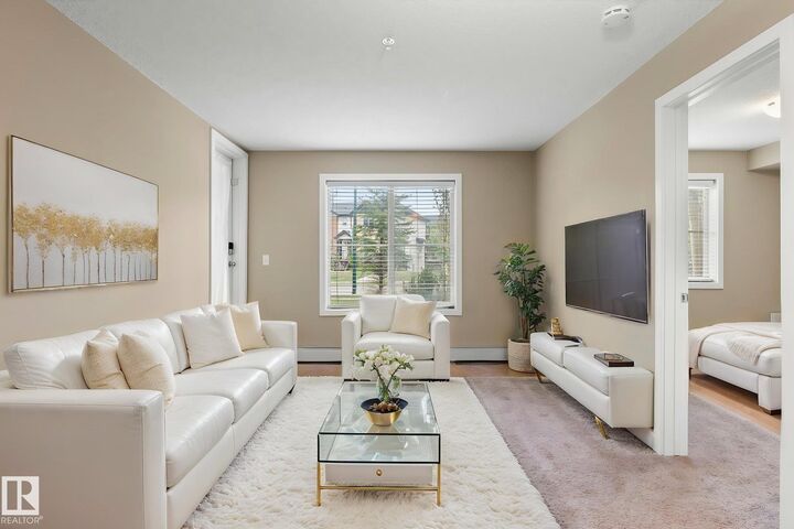 Property Photo:  12025 22 Avenue SW 116  AB T6W 2Y1 