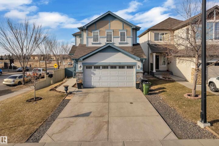 Property Photo: 6156 11 Avenue SW AB T6X 0M4