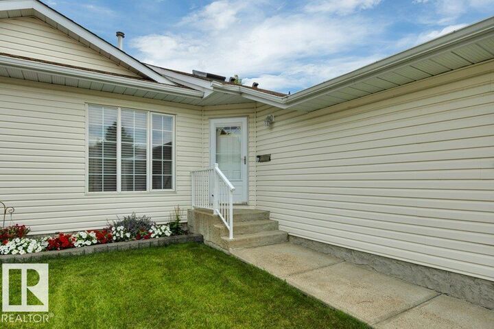 Property Photo: 221 Ravine Villa(S) AB T9E 8B9