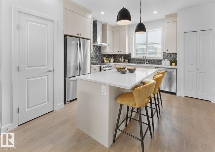 Property Photo: 224 Chappelle Drive SW AB T6W 5X8