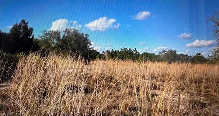 Property Photo:  56th Ave NE  FL 34120 