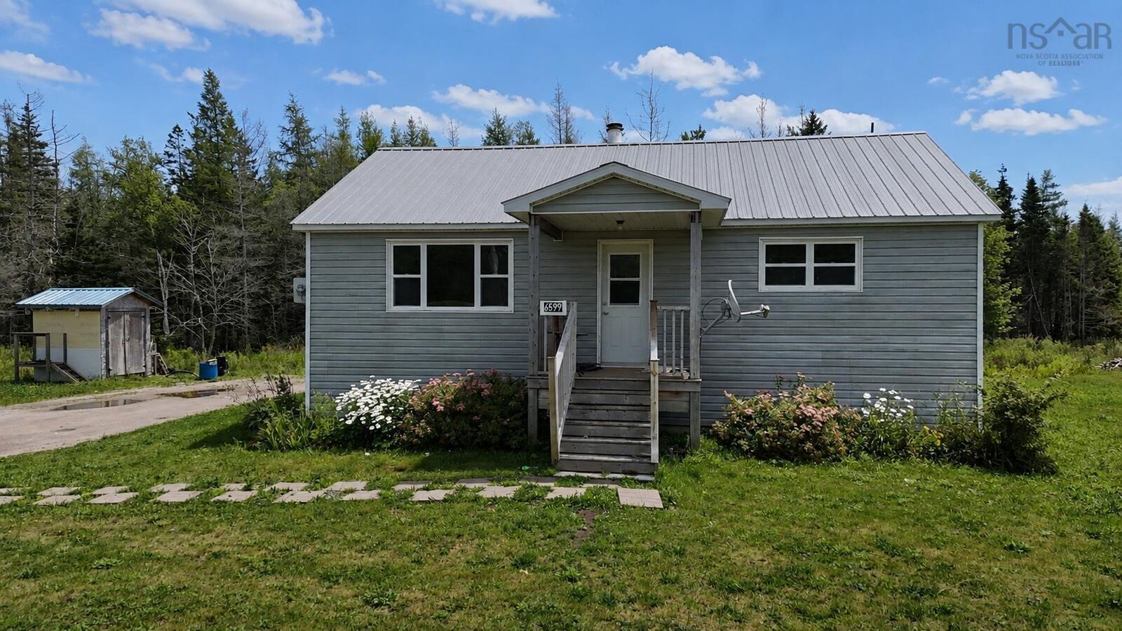 Property Photo:  6599 Cabot Trail  NS B0E 2H0 