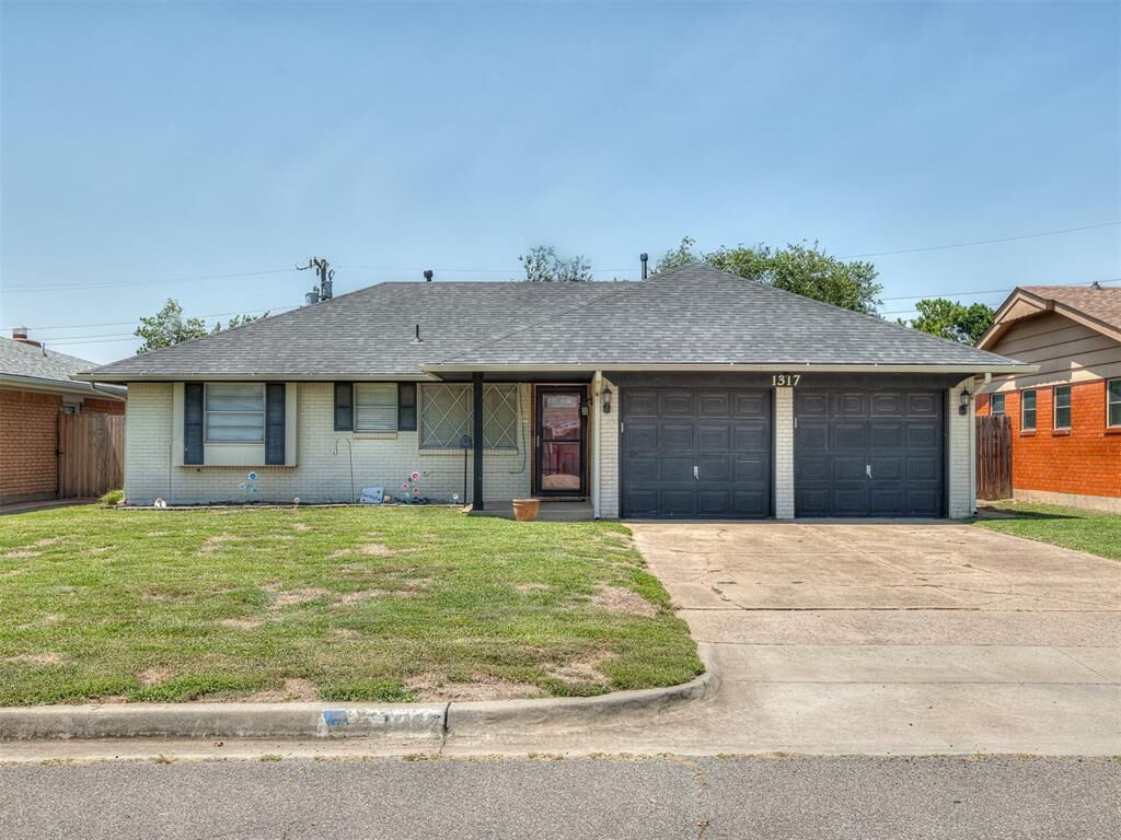Property Photo:  1317 Regency Boulevard  OK 73160 