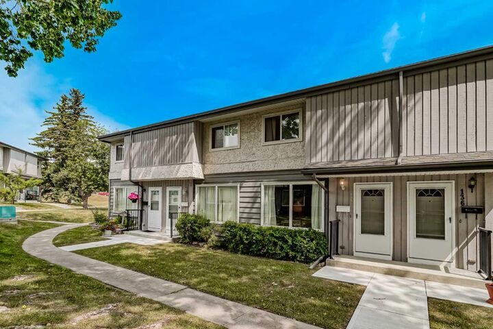 Property Photo:  999 Canyon Meadows Drive SW 137  AB T2W 2S6 