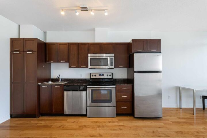 Property Photo:  3830 Brentwood Road NW 1310  AB T2L 2J9 