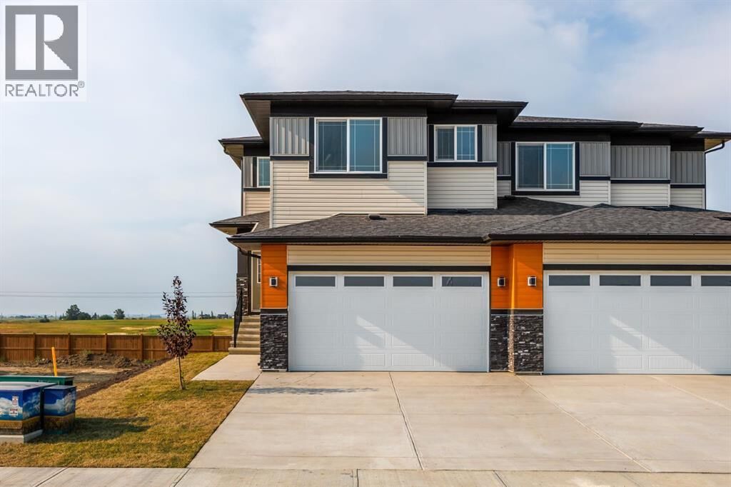 Property Photo: 142 Lakewood Crescent AB T1P 0G6