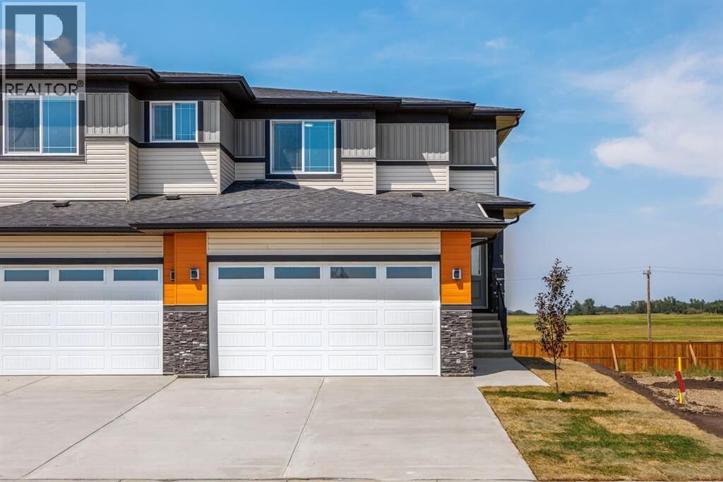 Property Photo: 140 Lakewood Crescent AB T1P 0G6