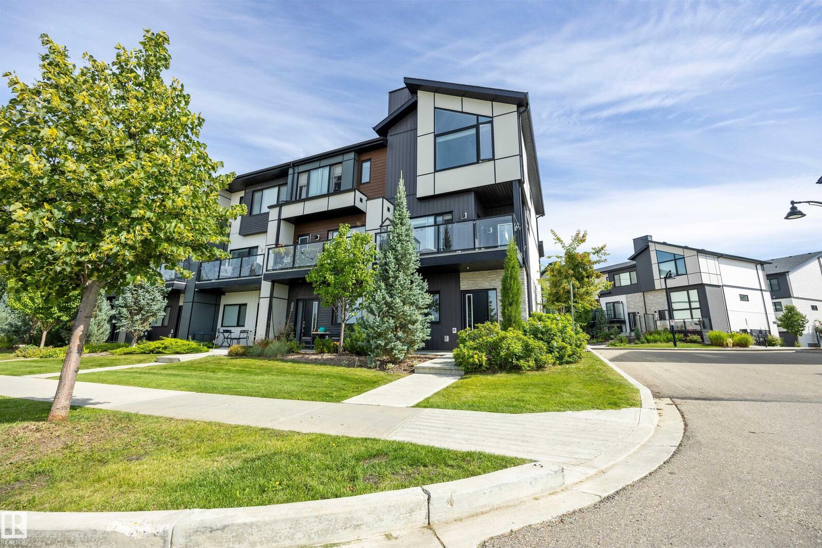 Property Photo: 1119 Keswick Drive SW AB T6W 4B6