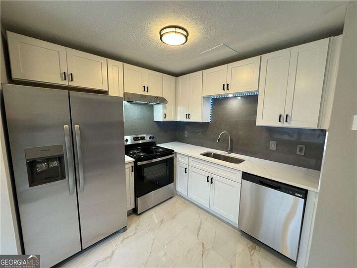 Property Photo: 5223 Ridge Forest Drive GA 30083