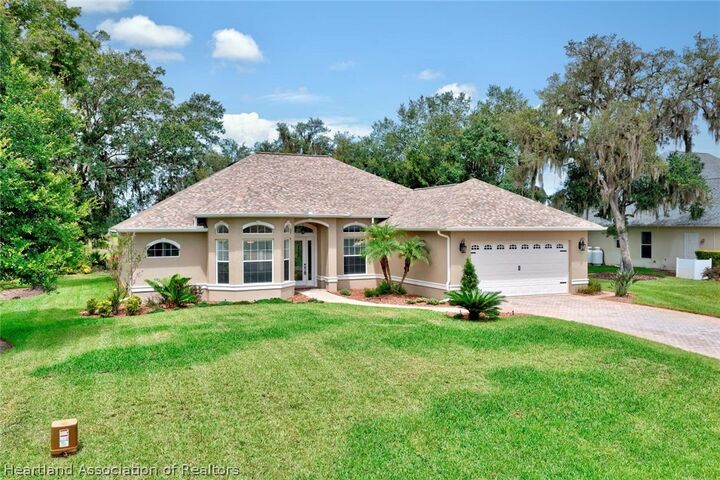 Property Photo:  3878 Enchanted Oaks Lane  FL 33875 