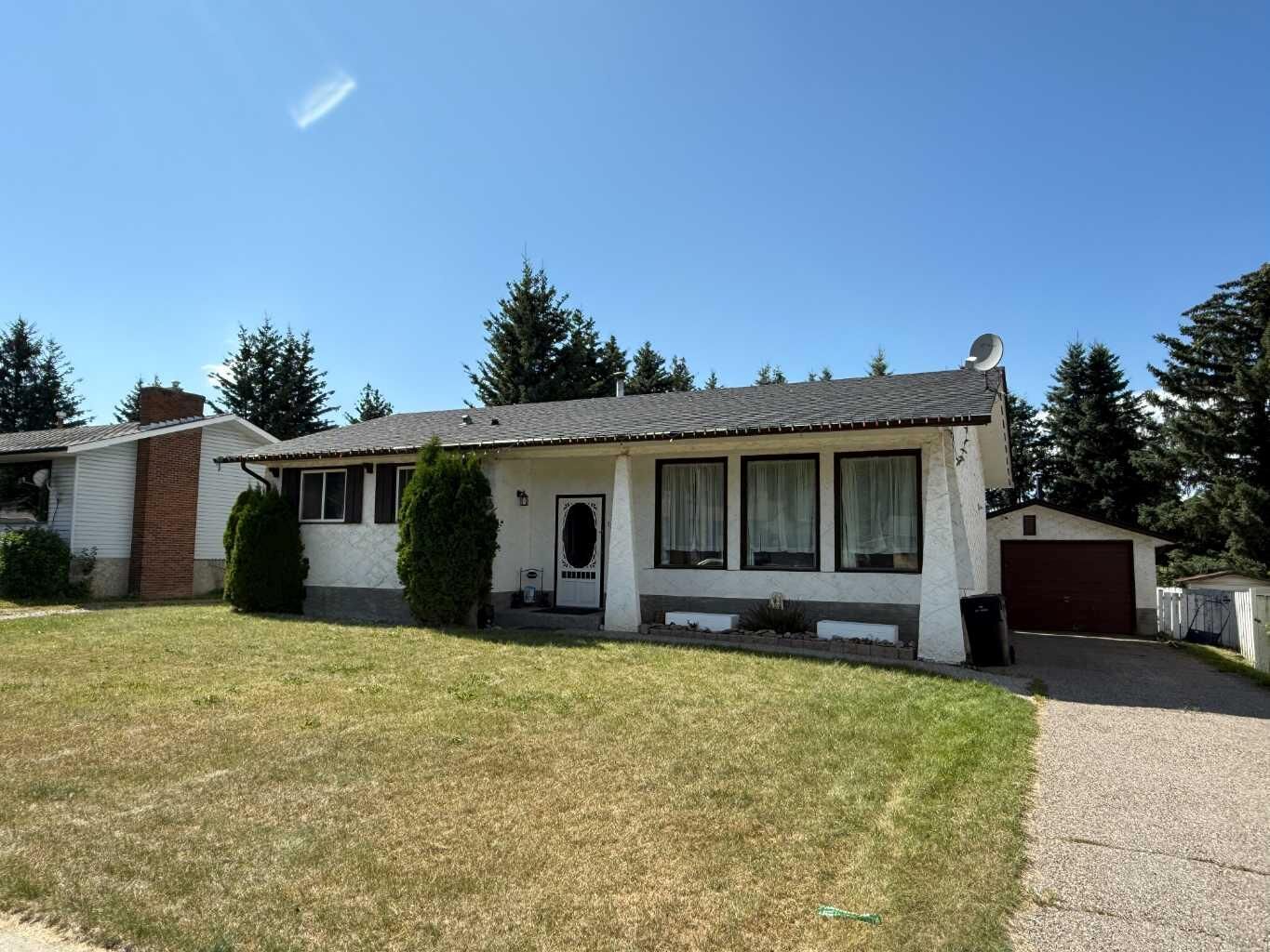 Property Photo: 129 Tamarack Avenue AB T7V 1C8