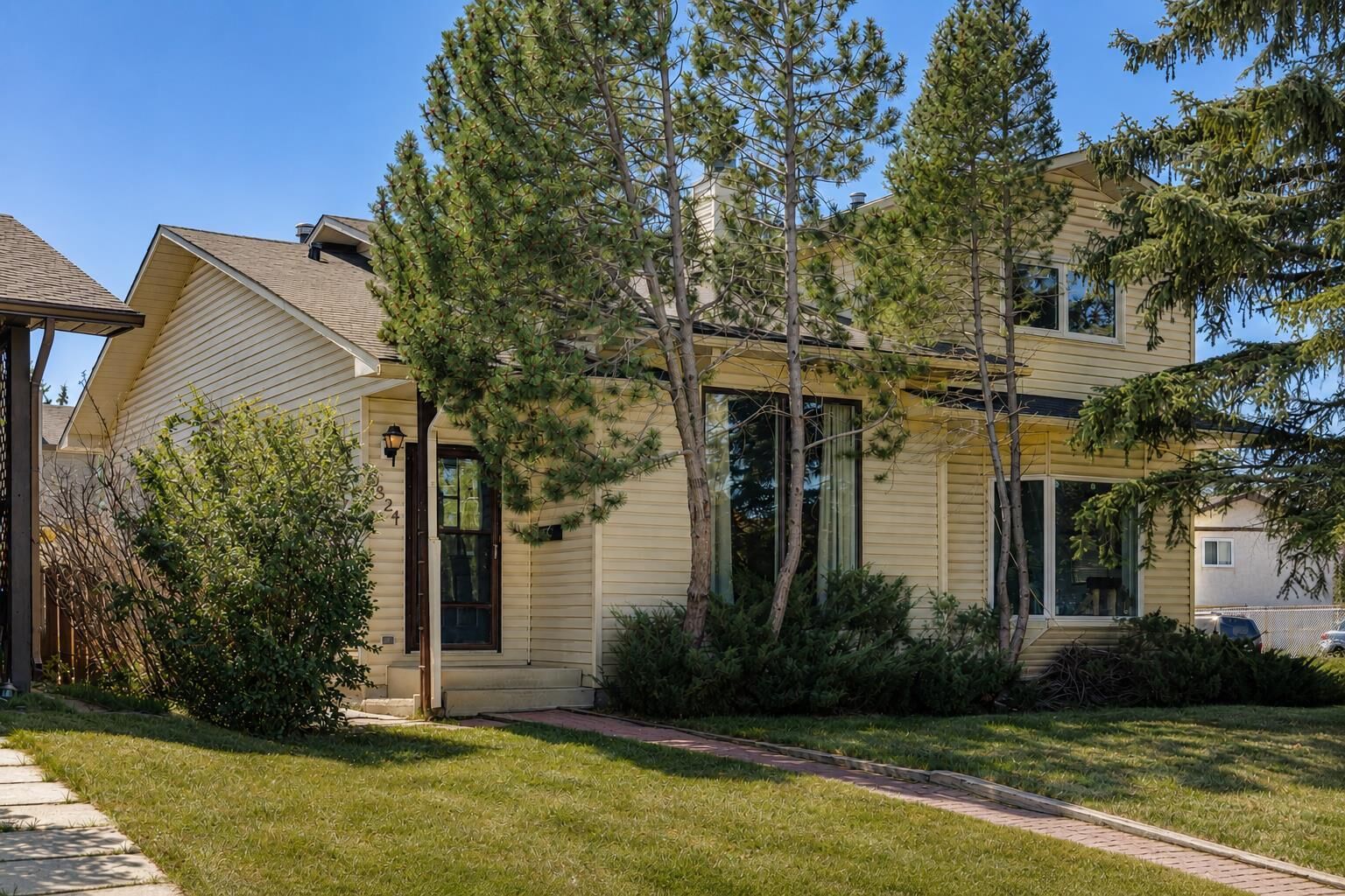 Property Photo: 3624 Cedarille Drive SW AB T2W 3X8