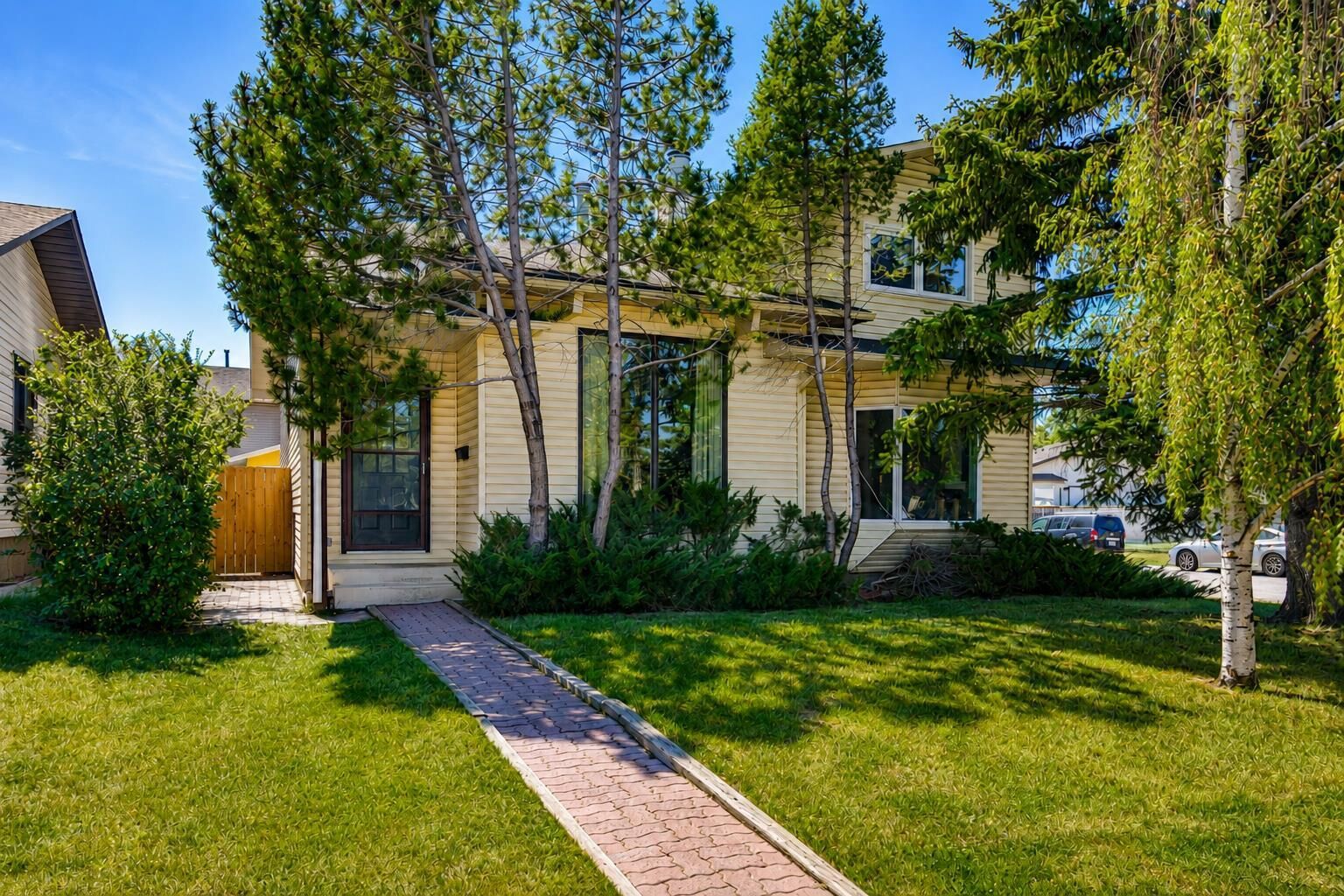 Property Photo: 3624 Cedarille Drive SW AB T2W 3X8