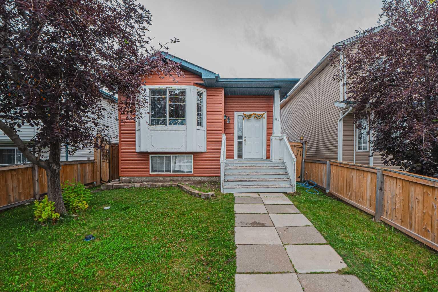 Property Photo:  65 Martinvalley Road NE  AB T3J 4L9 